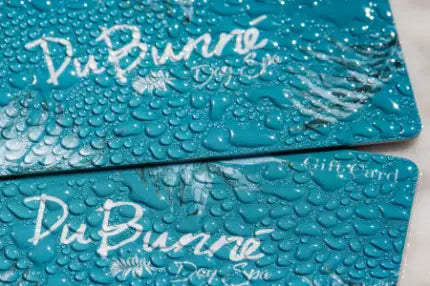 close up of DuBunne gift cards, covered in water droplets